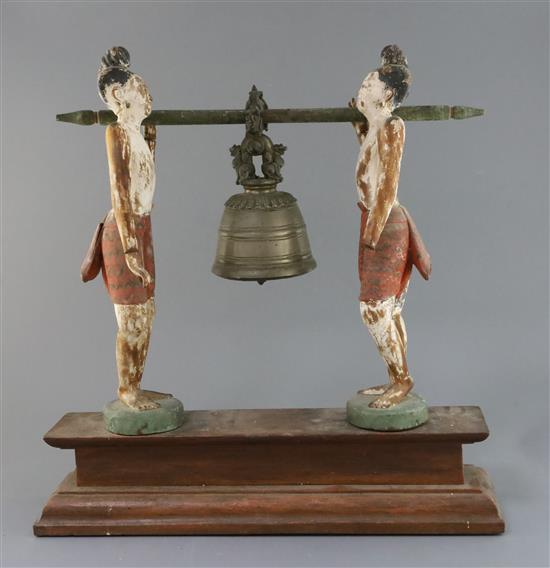 A Burmese bronze bell and polychrome wood stand, late 19th/early 20th century, Total height 51cm